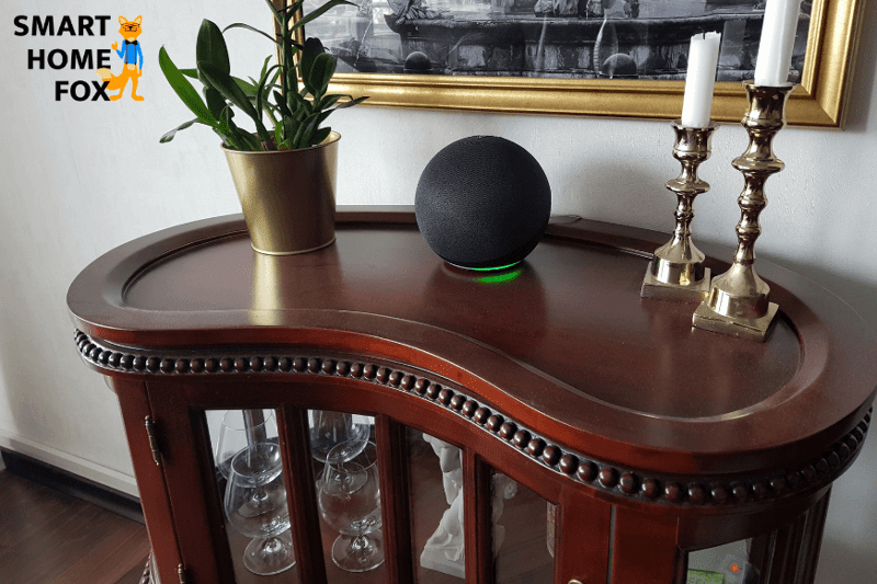 The light ring of an Alexa Echo is flashing green
